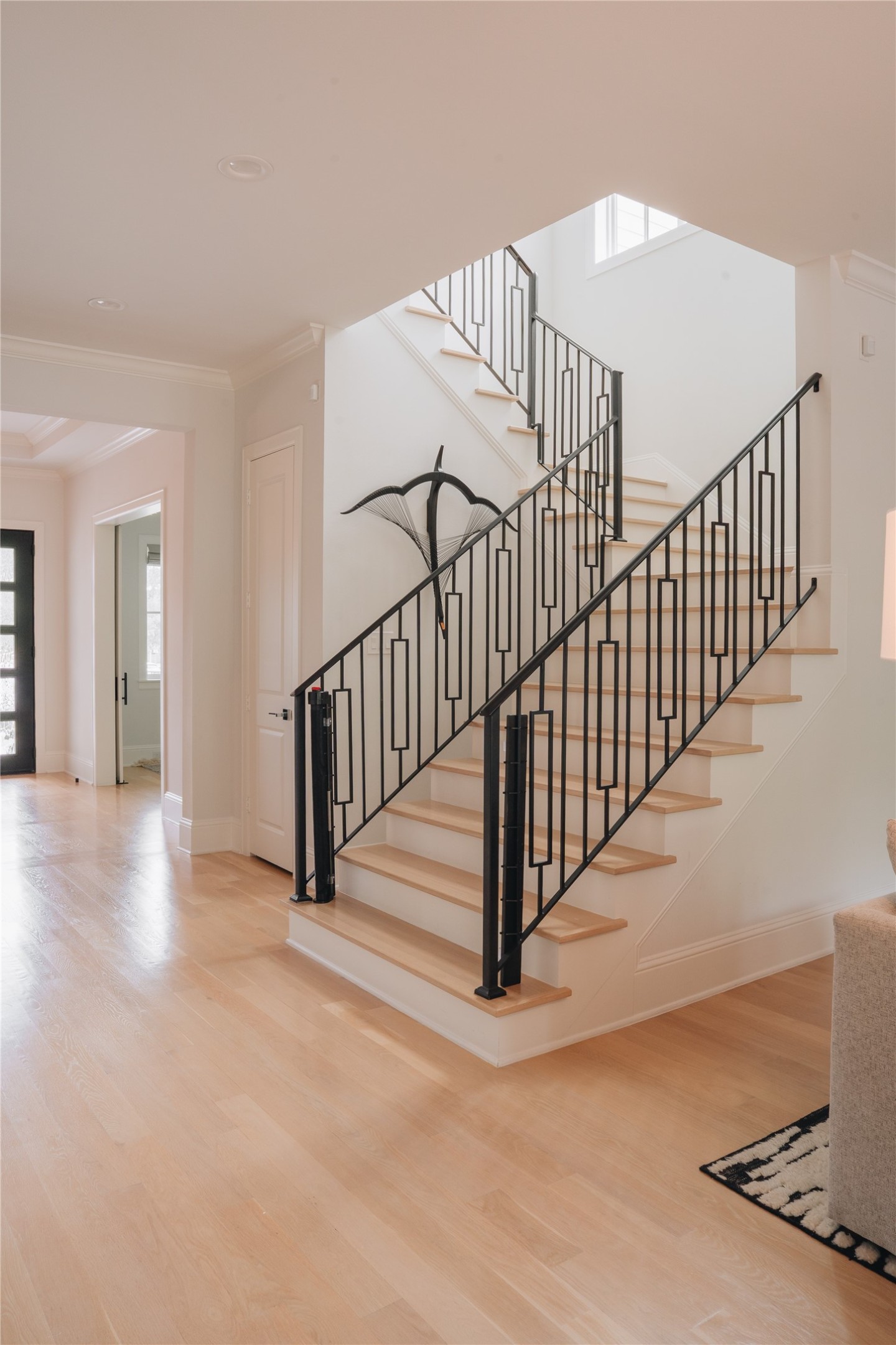 3817 Aberdeen Way Houston, TX 77025 - Photo 23 of 45 Back downstairs view to the entryway and stairwell.
