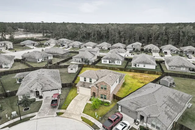 a view of a swimming pool with seating area