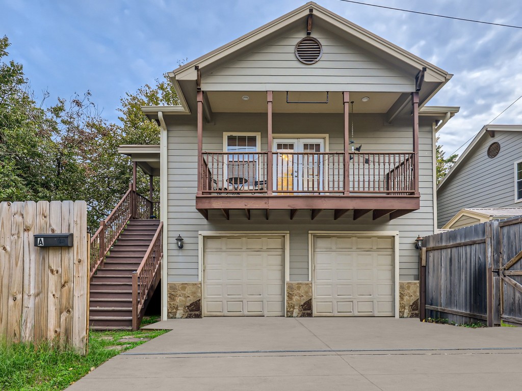 a front view of a house with garage
