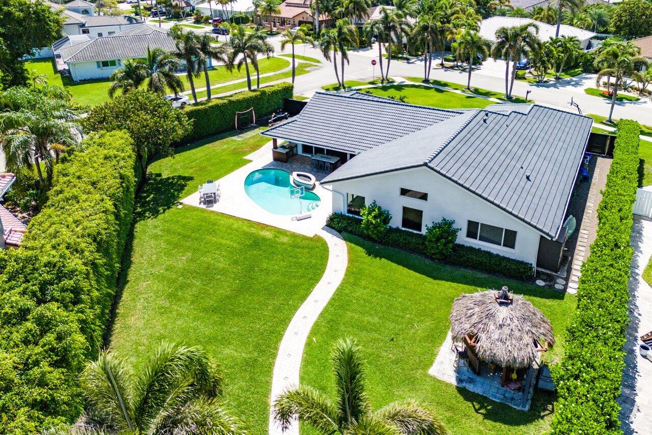 7700 Northeast Spanish Trail Court Boca Raton, FL 33487 - Photo 3 of 30 23