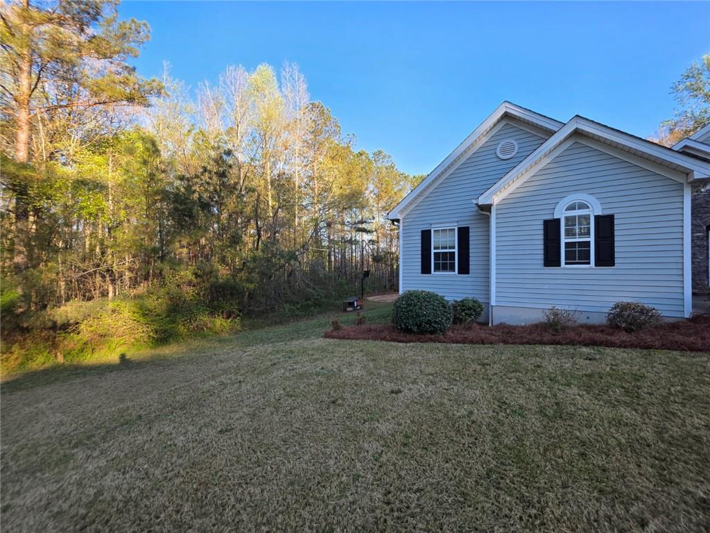 7387 Milam Road Winston, GA 30187 - Photo 4 of 41 a view of a house with a yard