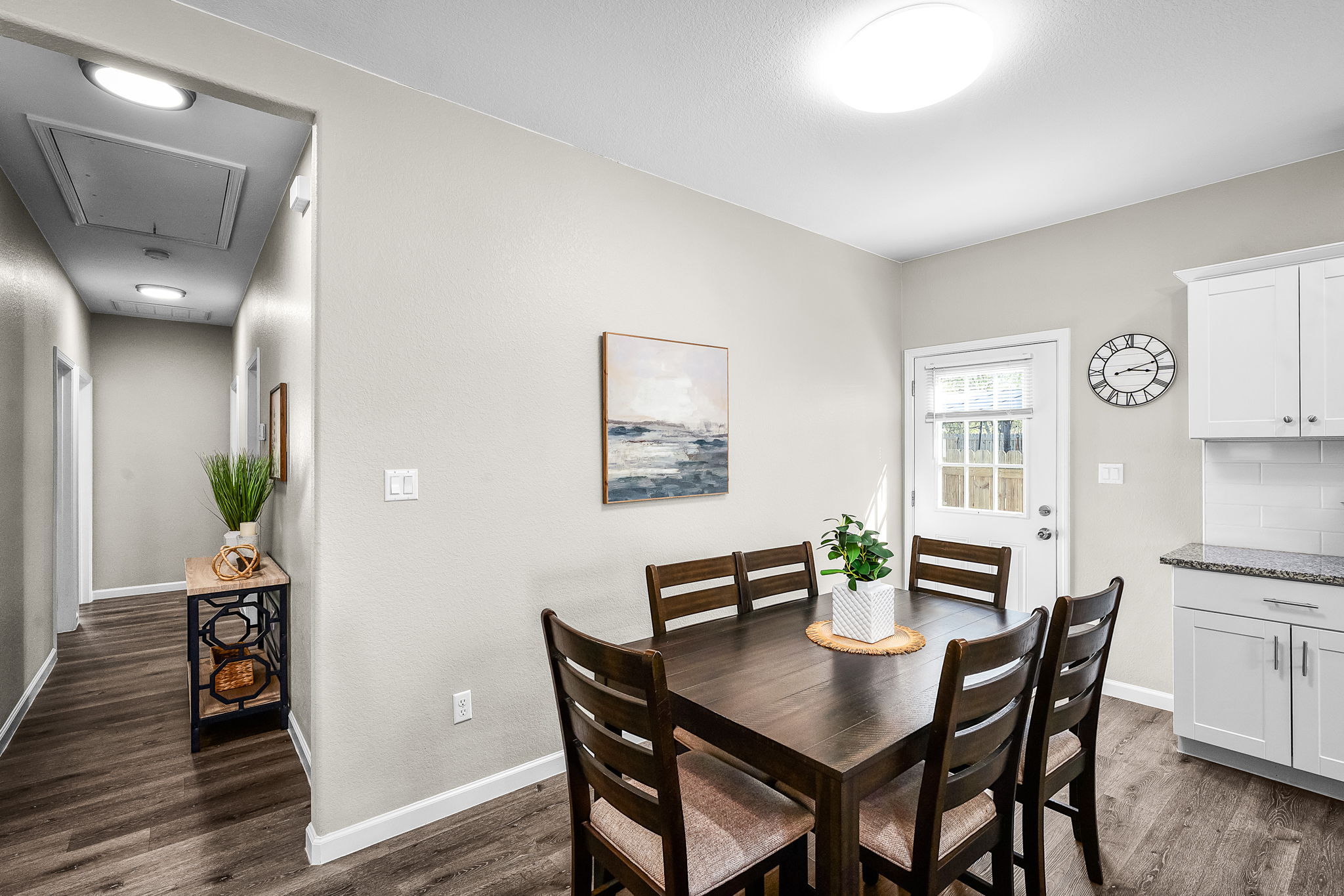 224 Spruce Avenue Luling, TX 78648 - Photo 13 of 31 a view of a dining room with furniture and wooden floor
