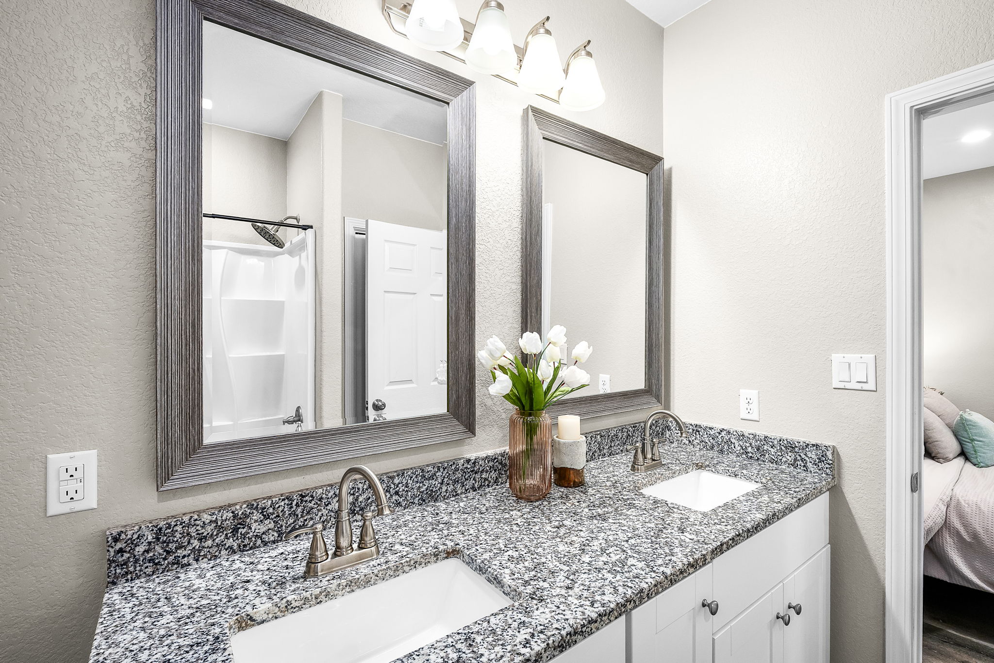 224 Spruce Avenue Luling, TX 78648 - Photo 16 of 31 a bathroom with sink and mirror
