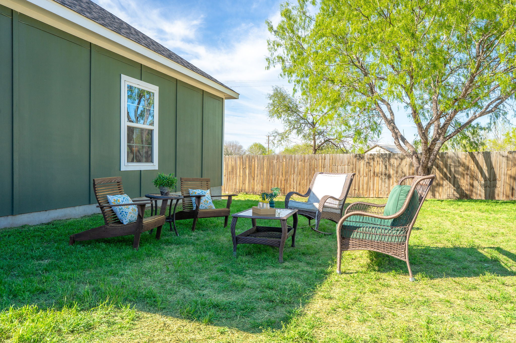 224 Spruce Avenue Luling, TX 78648 - Photo 23 of 31 a view of a house with backyard sitting area and garden