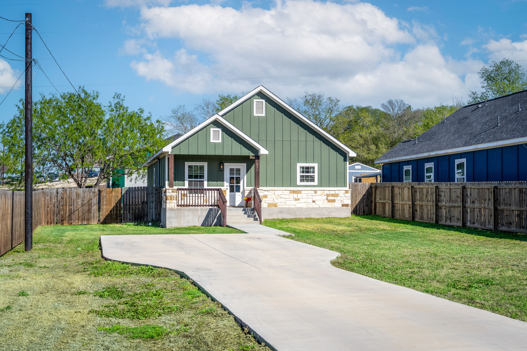 224 Spruce Avenue Luling, TX 78648 - Photo 26 of 31 a view of a house with a yard patio and a small yard