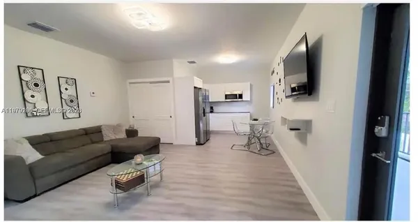 a house with a table and chairs