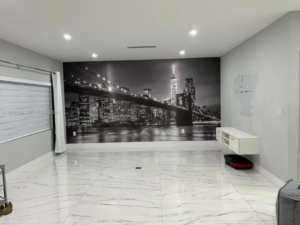 a view of entryway with livingroom