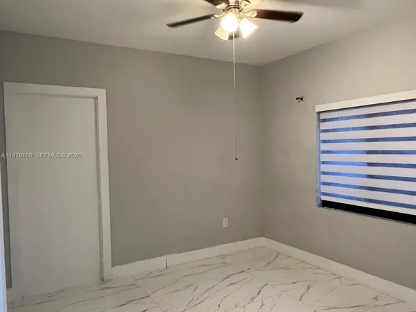 an empty room with a window