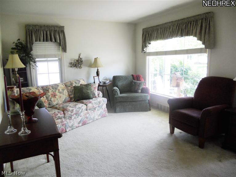 1635 Harwich Road Cleveland, OH 44124 - Photo 2 of 11 Spacious Living Room with Newer Windows and Hardwood Floors under Carpeting
