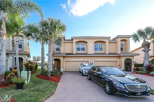 a car parked in front of a house