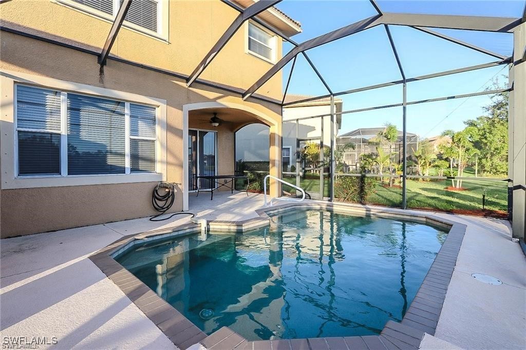 20056 Larino Loop Estero, FL 33928 - Photo 19 of 31 a swimming pool with outdoor seating
