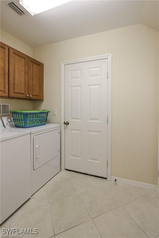 20056 Larino Loop Estero, FL 33928 - Photo 21 of 31 a utility room with cabinets washer and dryer