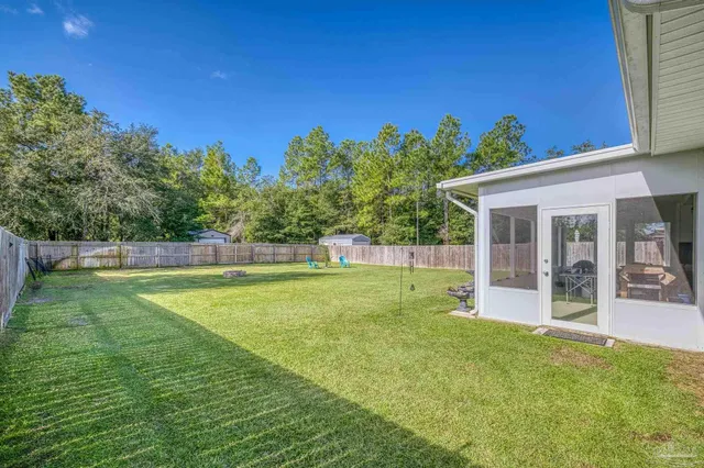 $474,900 | 7979 Majestic Cypress Drive, Milton, FL 32583