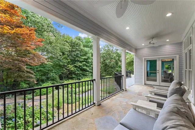 a kitchen that has a sink and a stove in it
