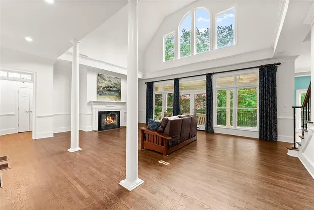 a balcony with furniture and a window