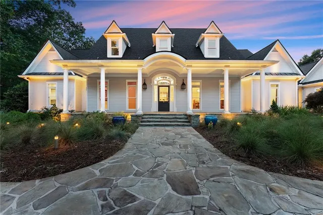 an aerial view of a house with mountain view