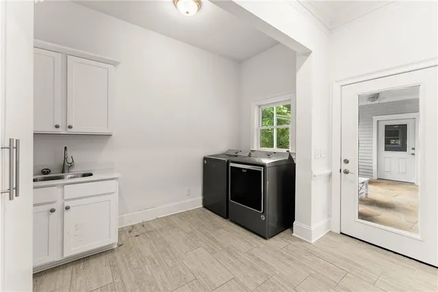 a view of empty room with wooden floor and fireplace