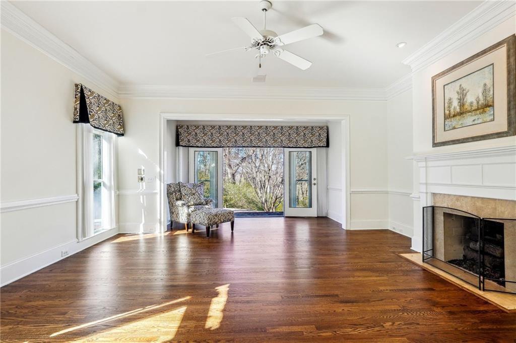 77 Old River Road Dahlonega, GA 30533 - Photo 47 of 98 a view of an empty room with wooden floor and a fireplace