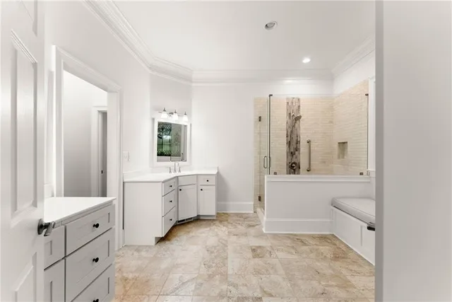 a view of a lush green forest with mountains in the background