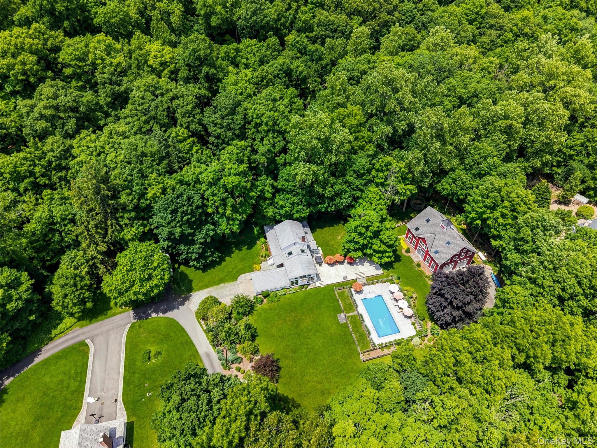 324 Haverstraw Road Suffern, NY 10901 - Photo 50 of 50 a backyard of a house with a yard and outdoor seating