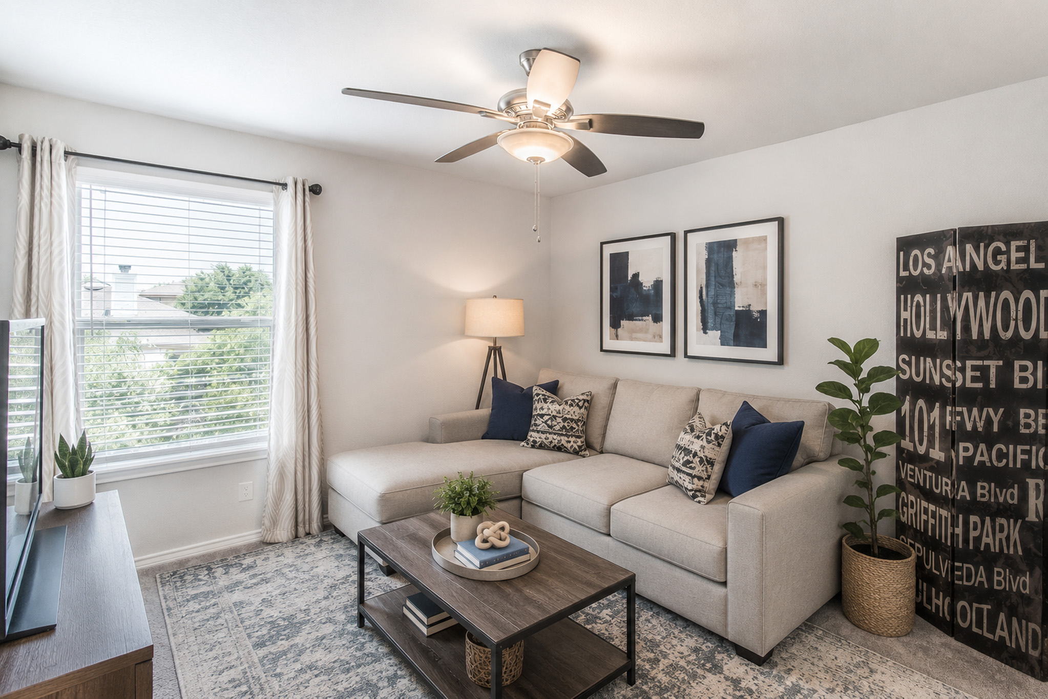 192 Spotted Rail Ridge Leander, TX 78641 - Photo 10 of 34 a living room with furniture and a window
