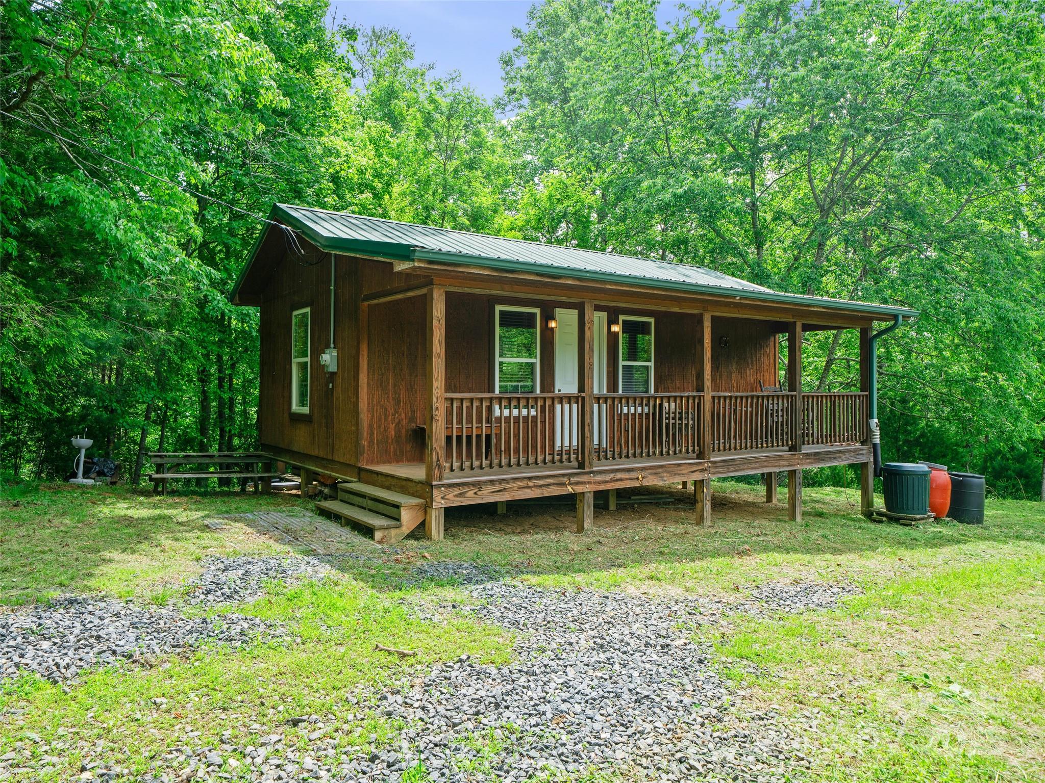 289 Bailey Settlement Road Green Mountain, NC 28740 - Photo 14 of 21 front view of a house with a yard