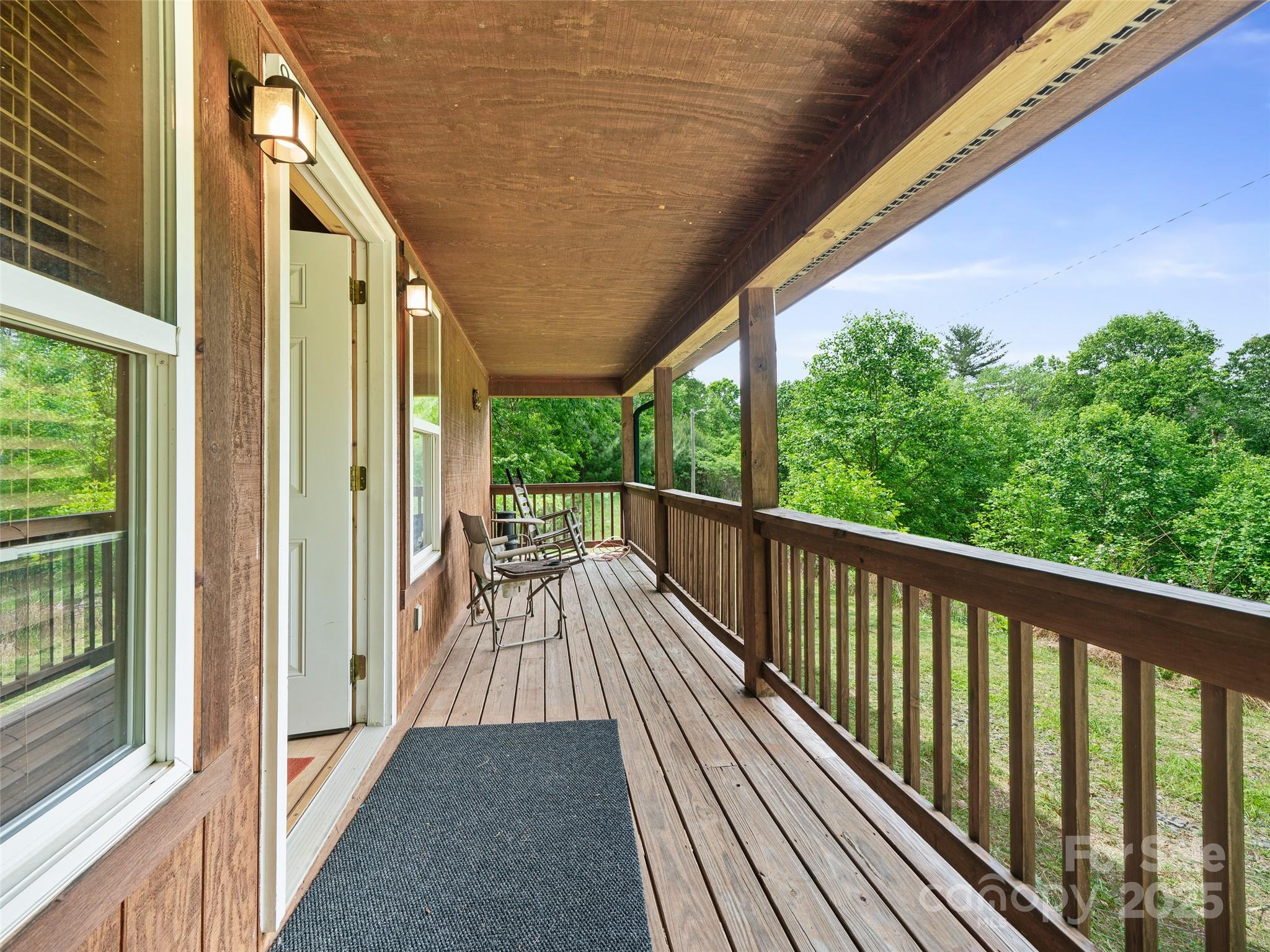 289 Bailey Settlement Road Green Mountain, NC 28740 - Photo 9 of 21 a view of balcony with wooden floor