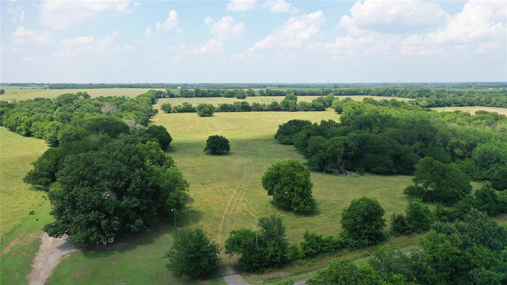 10948 Fm 898 Whitewright, TX 75491 - Photo 11 of 39 an aerial view of a houses with outdoor space and trees all around