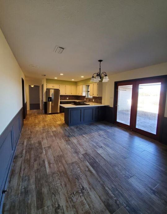 10948 Fm 898 Whitewright, TX 75491 - Photo 27 of 39 a large hall with wooden floor and furniture
