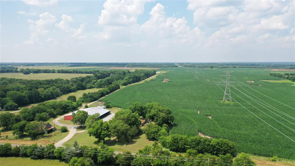 10948 Fm 898 Whitewright, TX 75491 - Photo 7 of 39 a view of a city with lush green forest