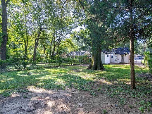 3530 Wilshire Road Memphis, TN 38111 - Photo 12 of 12 a view of a park with large trees