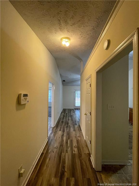 522 Longview Drive, Unit B Fayetteville, NC 28311 - Photo 2 of 10 a view of a hallway with wooden floor and staircase