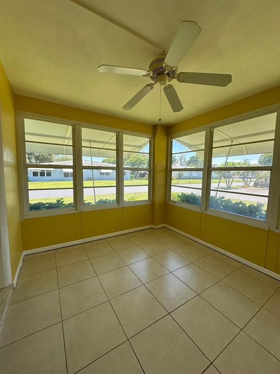 665 High Point Drive Delray Beach, FL 33445 - Photo 18 of 22 a view of an empty room with a window