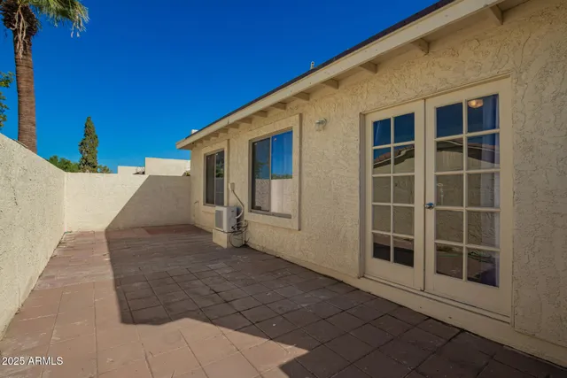 a view of a house with a large window