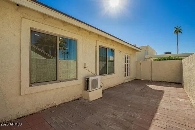 a view of a house with a large window
