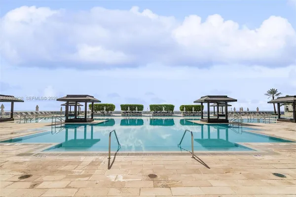 a view of a swimming pool and a terrace