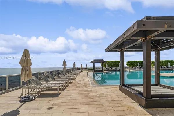 a view of a terrace with chairs
