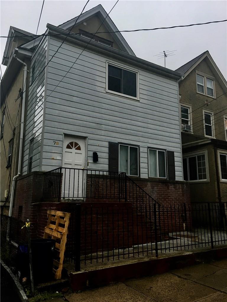 78 St Johns Place New Rochelle, NY 10801 - Photo 1 of 1 a view of a house with a yard