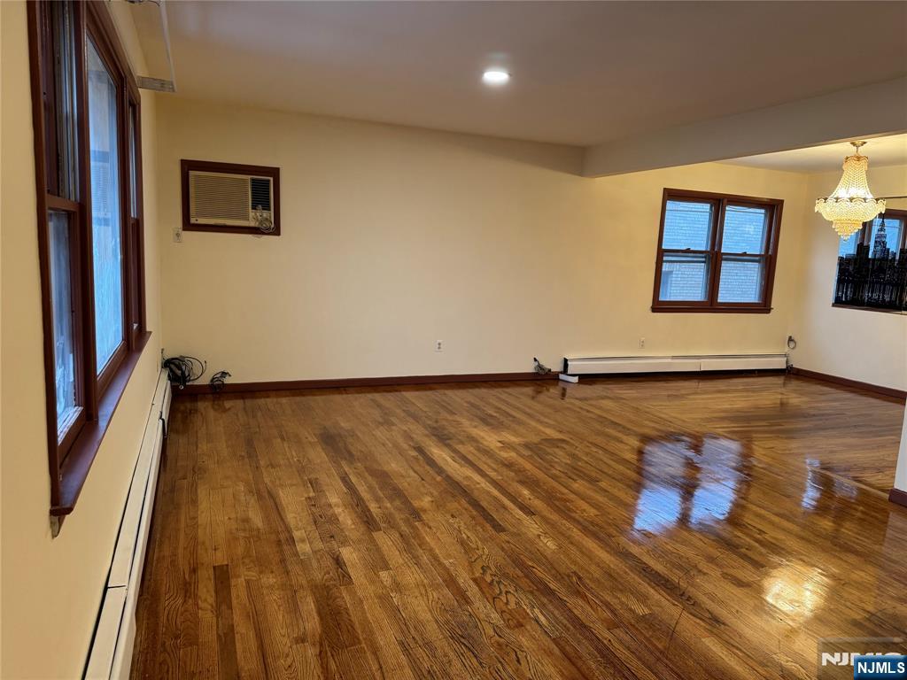4 Chestnut Street Rutherford, NJ 07070 - Photo 4 of 29 a view of a room with wooden floor and window