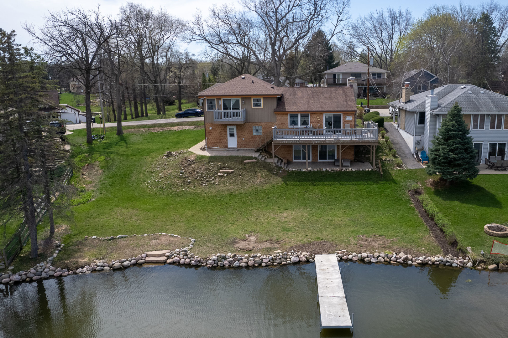 22152 120th Street Bristol, WI 53104 - Photo 1 of 1 a view of a house with a yard table and chairs