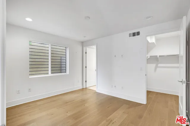 a bathroom with a sink toilet tub and shower