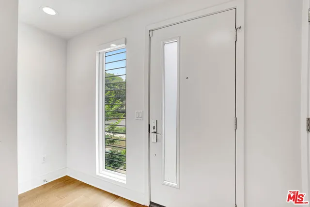 a front view of a house with a garage