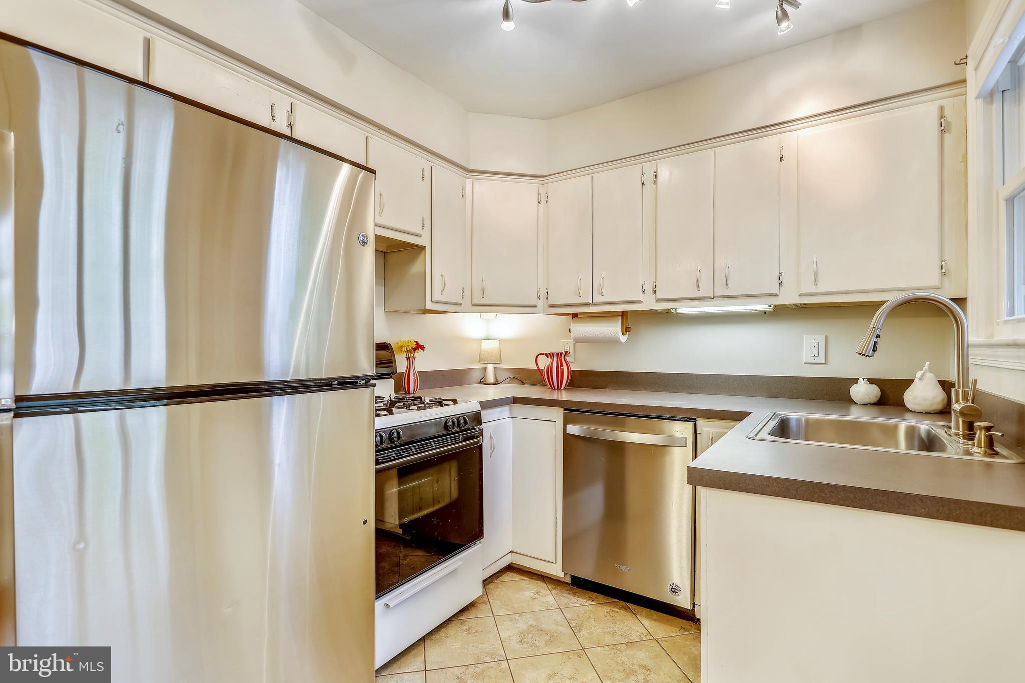 10600 Malone Street Silver Spring, MD 20902 - Photo 10 of 33 Bright White Kitchen with Stainless Appliances!