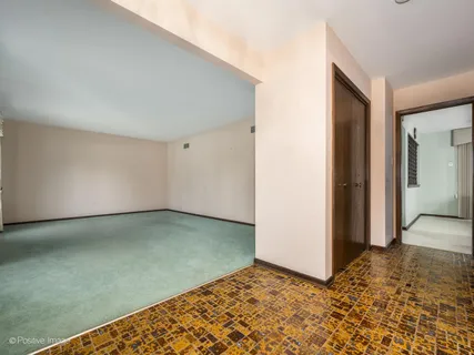 an empty room with a bench