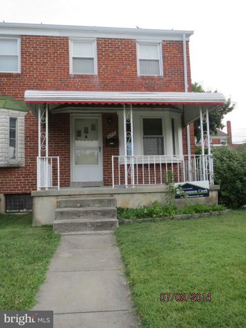 455 Torner Road Baltimore, MD 21221 - Photo 1 of 30 a front view of a house with garden