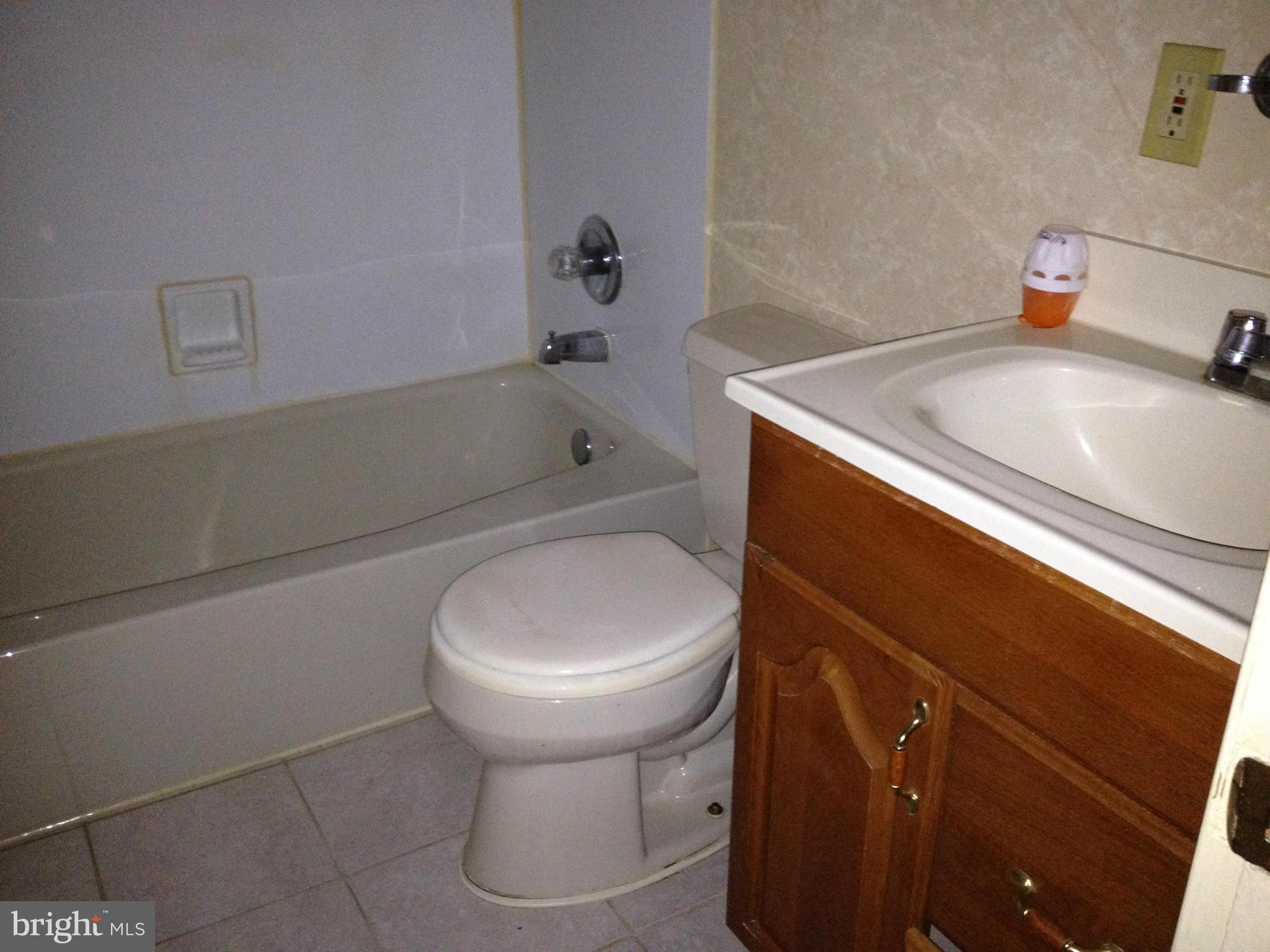 455 Torner Road Baltimore, MD 21221 - Photo 16 of 30 a bathroom with a sink and toilet