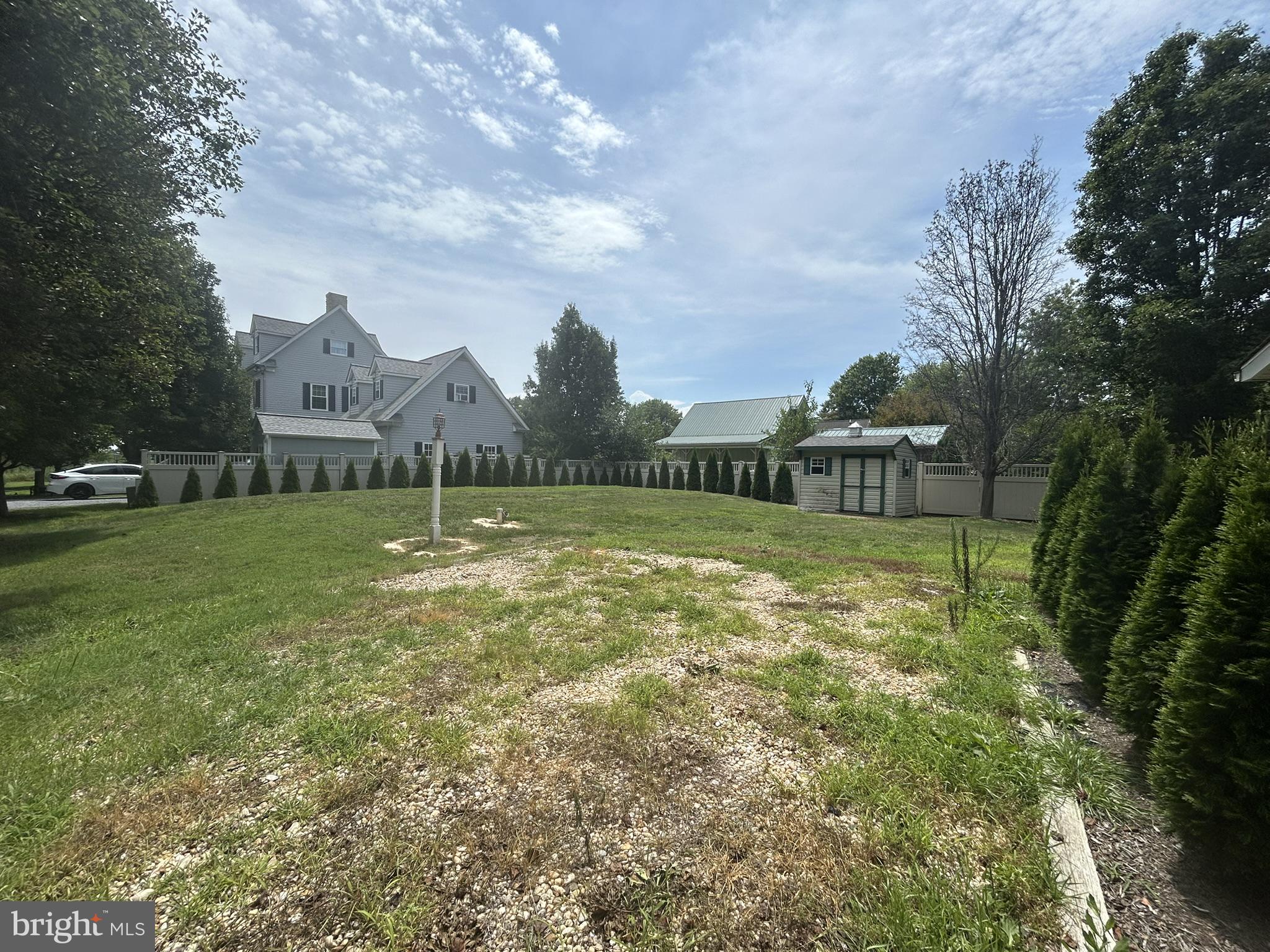 4869 Bar Neck Road Tilghman, MD 21671 - Photo 3 of 22 Spacious yard with serene surroundings.