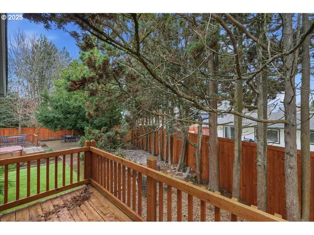 a view of a wooden fence