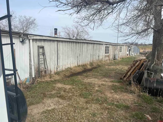 a view of car parked in front of a house