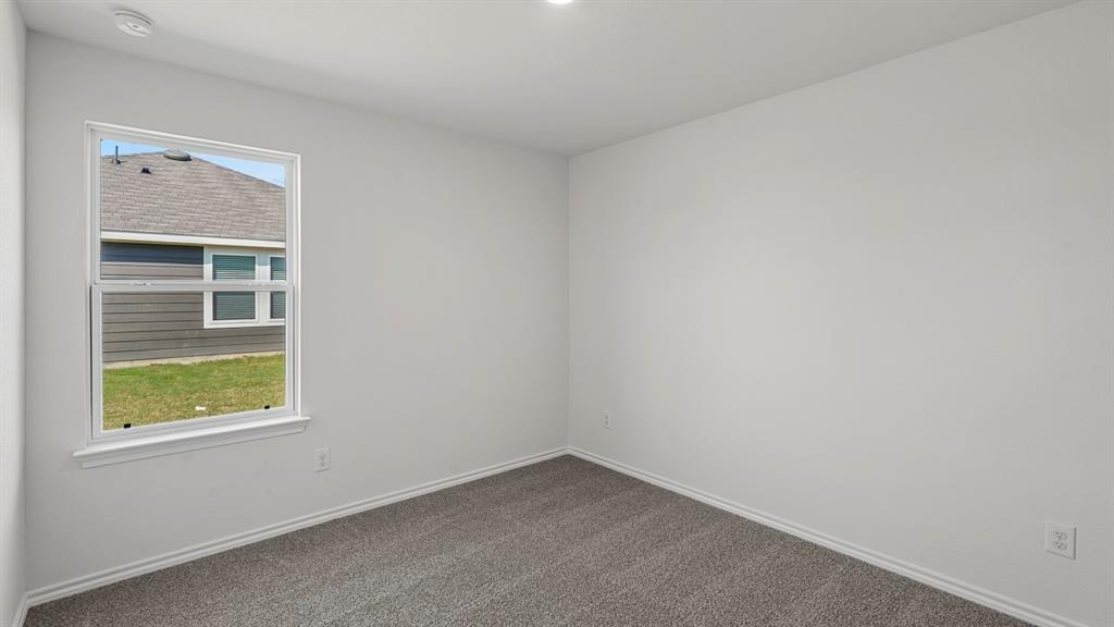 628 Dunham Road Farmersville, TX 75442 - Photo 8 of 36 Recessed ceiling lighting, a single window, and neutral wall paint